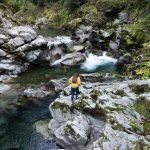 woman walking along Elk River