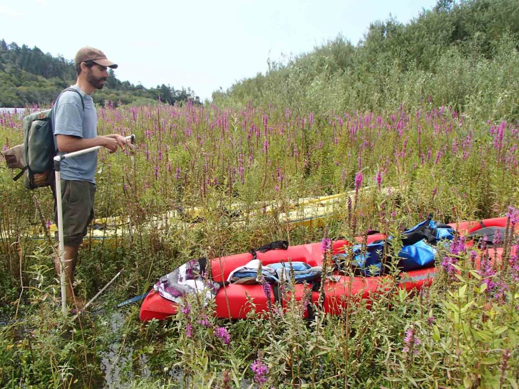 equipment and kayak at river