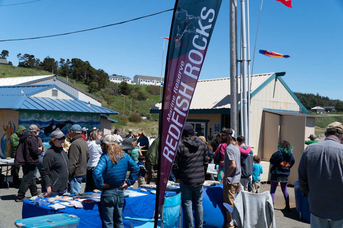 Booths and tables at Redfish Rocks on the Docks