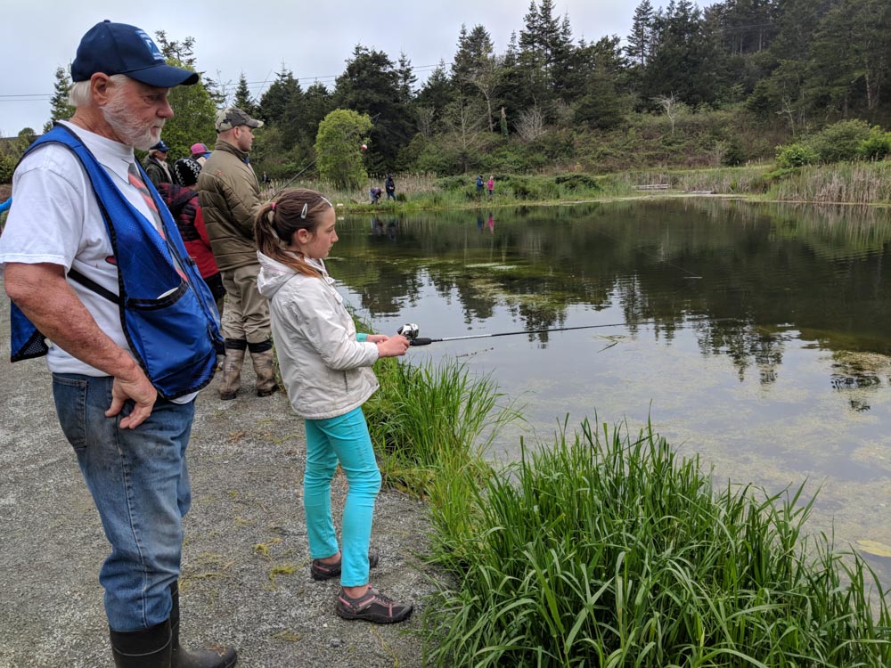 Fishing alongside children